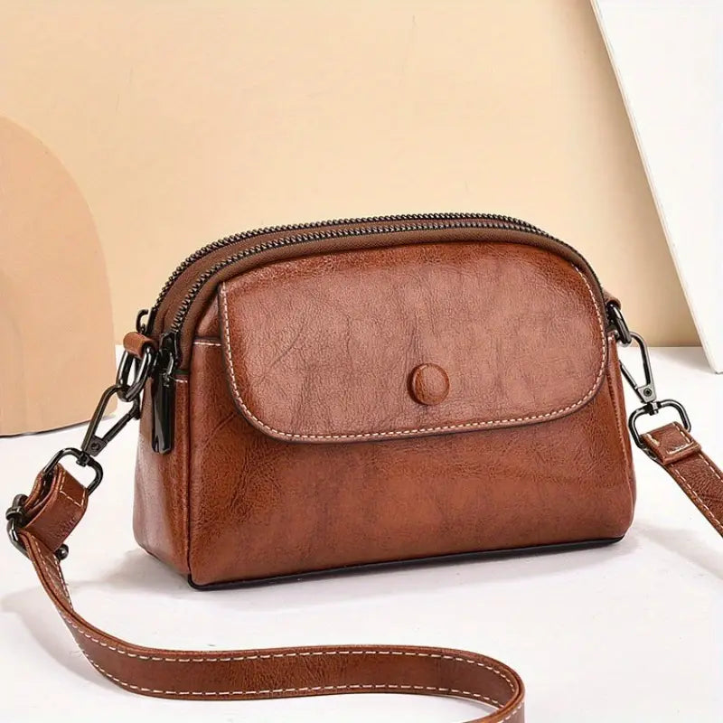 Elegant Women’s Crossbody Bag with Detachable Strap & Zipper Closure