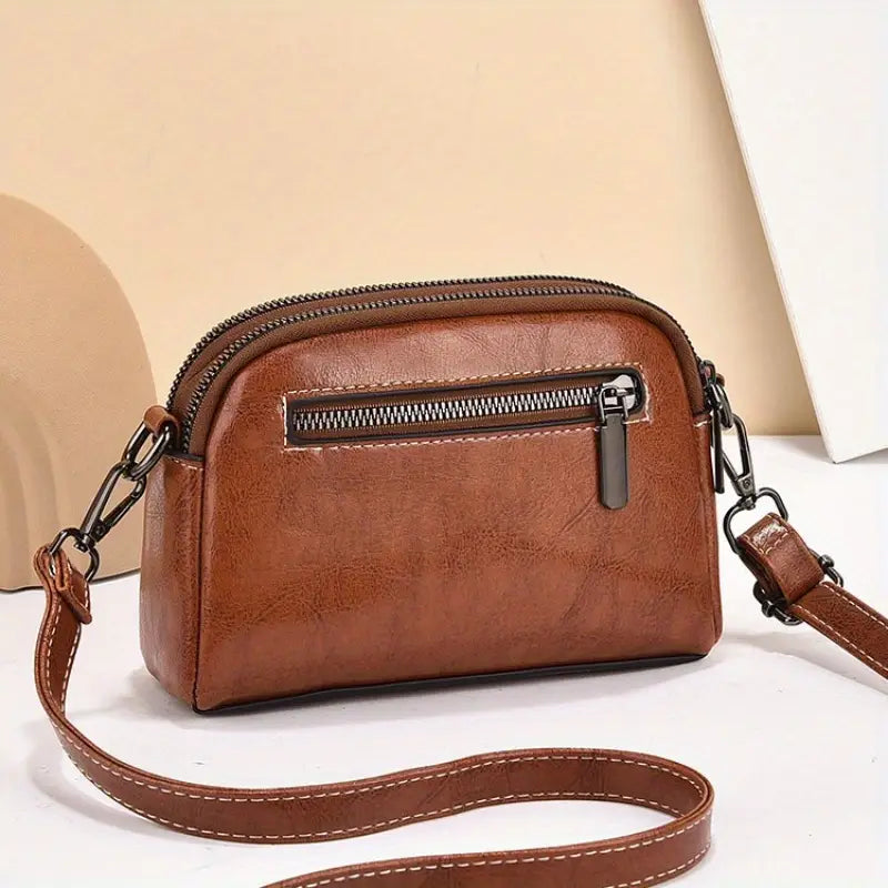 Elegant Women’s Crossbody Bag with Detachable Strap & Zipper Closure